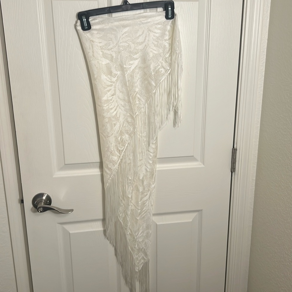 White shawl with fringe detail